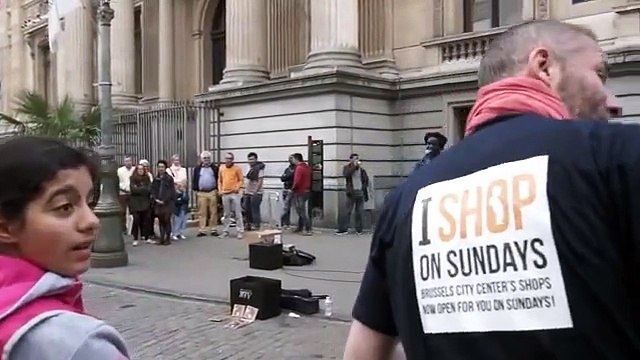 street artist sings a song by Bob Marley, then emerges a voice from the crowd. Their duet is creepy!