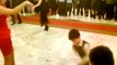 A child begins to dance at a wedding. His performance stole the show from the bride and groom!