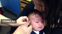 The reaction of a baby that hear for the first time