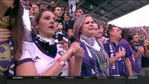 Orlando City SC fans sing the National Anthem ahead of Stadium opener