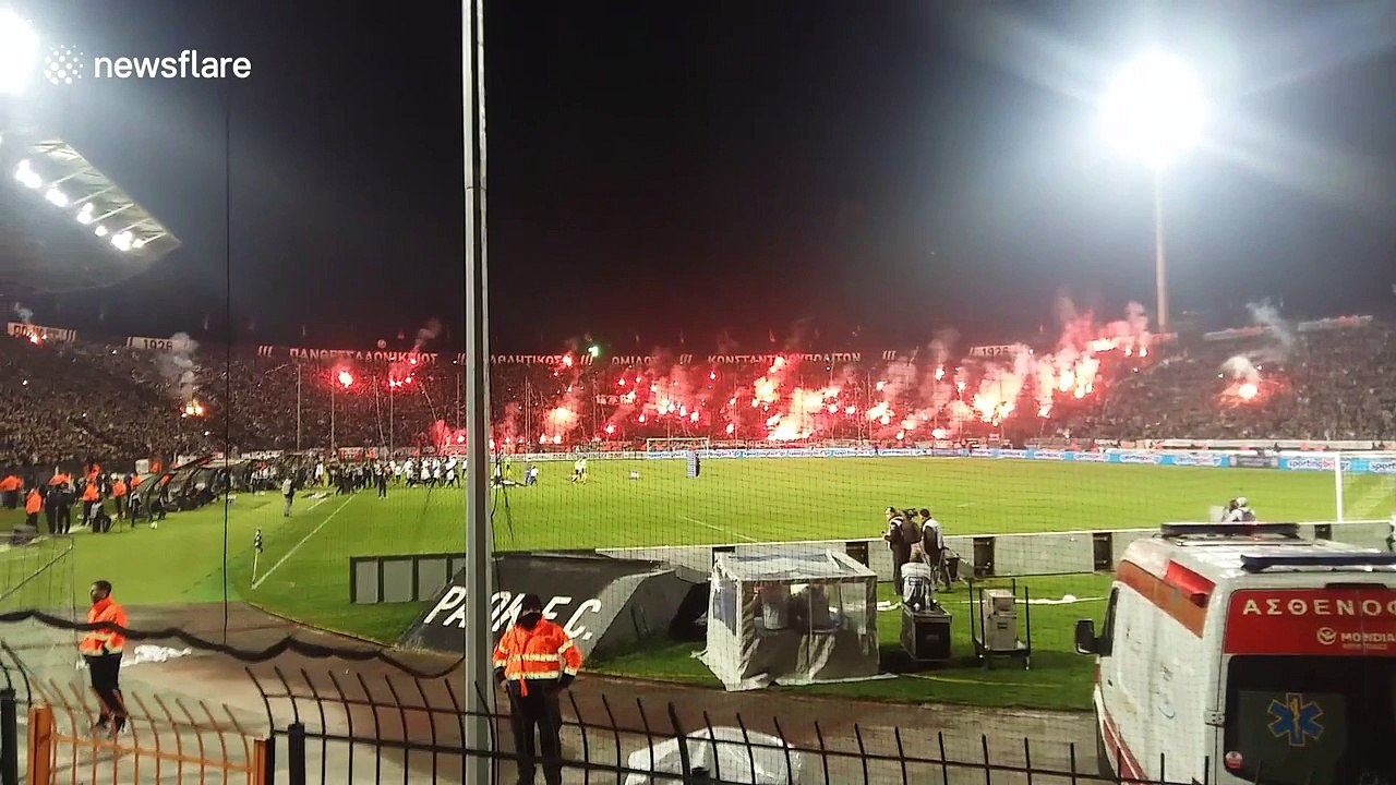 Football fans light up flares at PAOK FC v. Olympiacos FC game