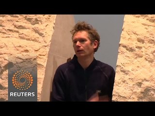 French artist to live in rock for a week