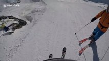 Skier spots friend stranded on the snow after checking his GoPro footage