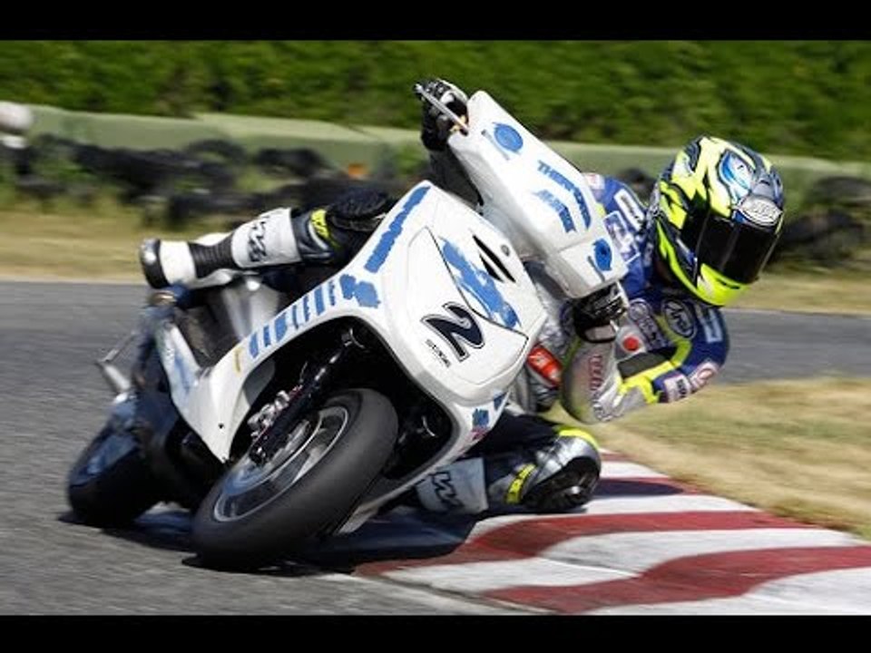 SCOOTERS ON A GO-KART TRACK