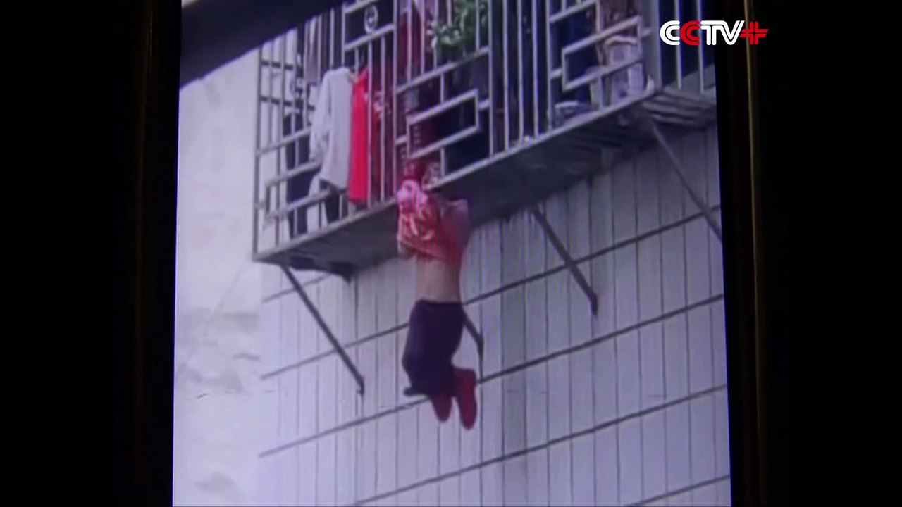 Two Men Save Girl Hanging by Neck From Fourth Storey Window