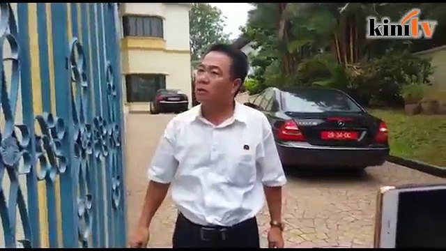 Blocked from leaving premises, N. Korean embassy official shouts for police