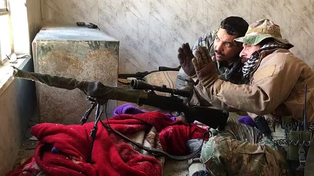 Mossoul: les forces irakiennes reprennent d'importants bâtiments