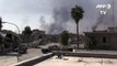 Iraqi forces retake government HQ, museum in Mosul