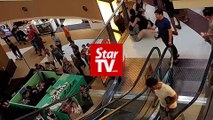 Woman’s leg gashed in mall escalator mishap