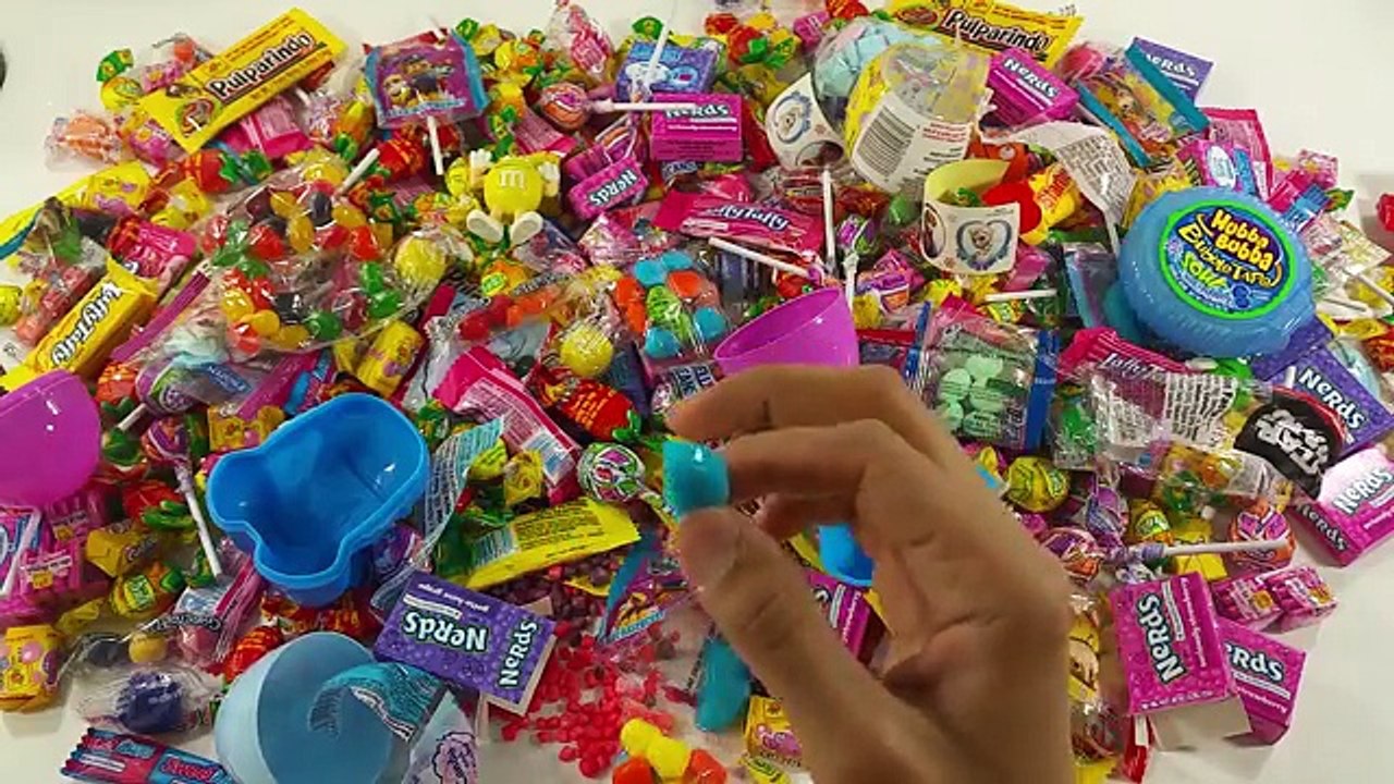 Trying A lot of New Candy and Opening New Surprise Eggs