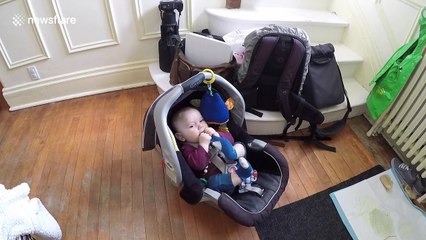 Cheeky baby won't stop pulling off and chewing on his socks