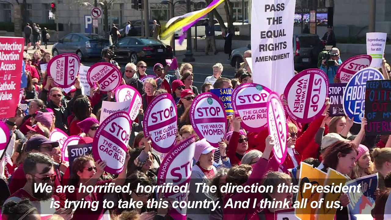 Crowds rally outside White House for women's rights