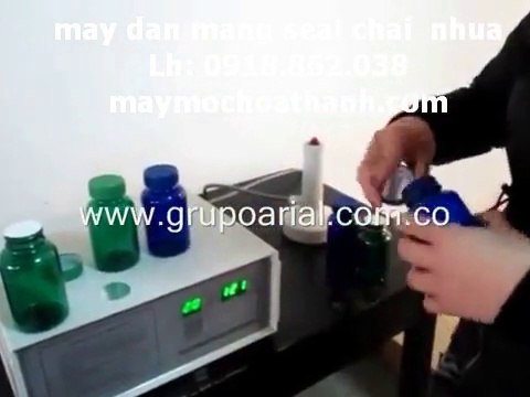 máy dán màng seal chai thuốc, máy ép màng nhôm miệng chai