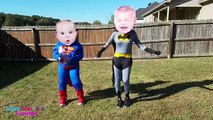 Batman and Superman Crying Baby Superheroes in Real Life Play Fight Over Giant Baby Bottle