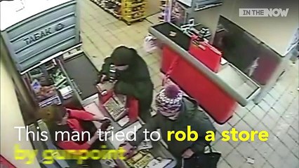 Russian cashier unfazed by armed robber