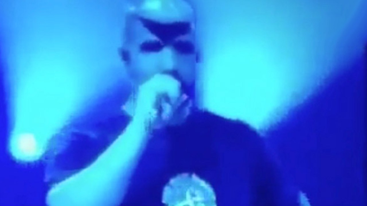 Drake Wears Kanye West Mask In Concert