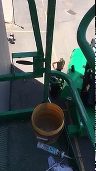 Crazy old man attacks painter in a lift.