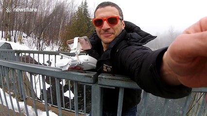 Beautiful drone footage from a dam on a misty winter day