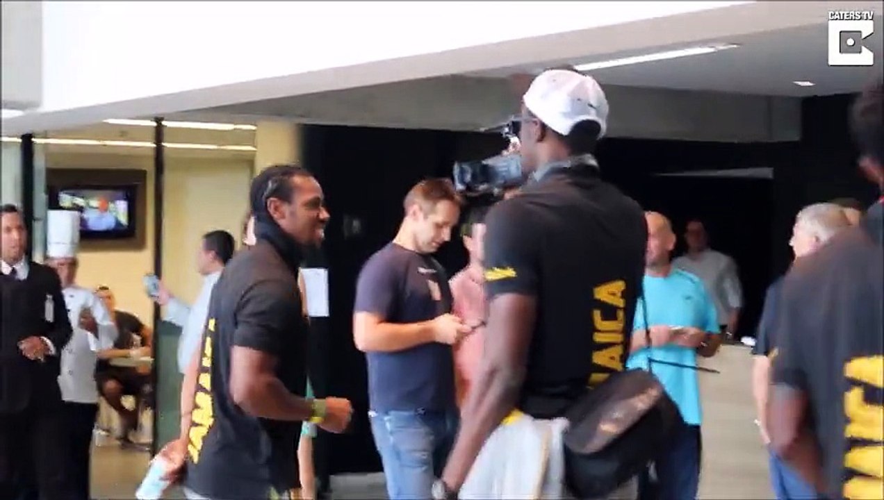 Usain Bolt Filming Team Mates In Brazil