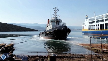 T/B MENTORAS LAUNCHING BACK TO THE WATER.