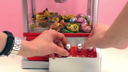 Bonbons à attraper avec la main mécanique de la kermesse | Main mécanique pour la maison |