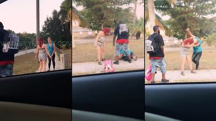 Une homme cogne une femme qui était en train de frapper sa copine