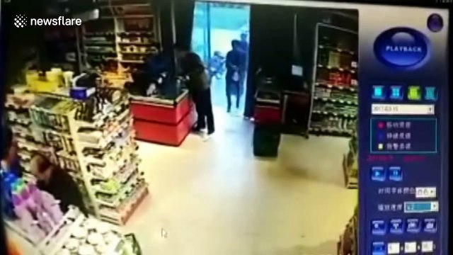 Car crashes into supermarket injuring two in central China