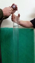 Fast Spinning Golf Ball Dropped in Water in Slow Motion