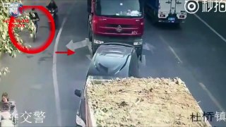 Scooter Rider Gets Run Over By A Truck & Survives