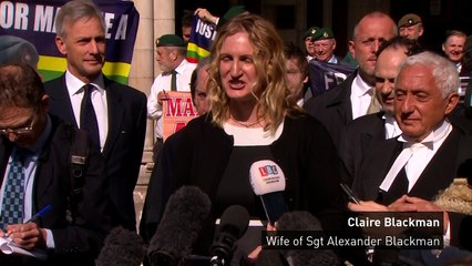 Claire Blackman, wife of Marine A, speaks outside court
