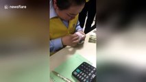 Chinese bankers show off amazing cash counting skills