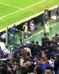 Porto fan jumps fence & runs to hug Juve fan give him a Porto scarf