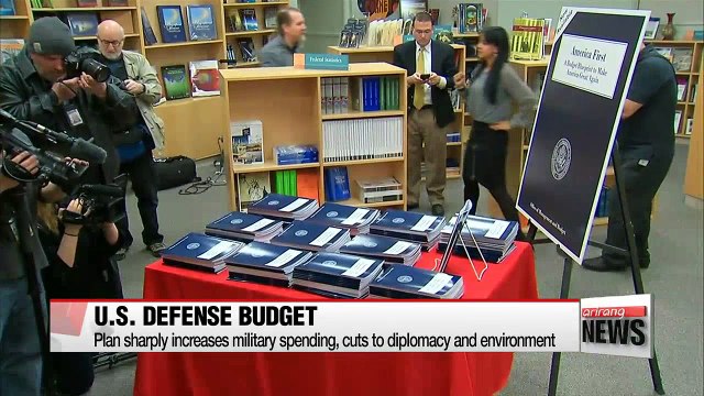 U.S. beefs up defense budget, cuts diplomacy and environment spending
