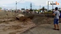 Woman escapes out of mudslide in Peru