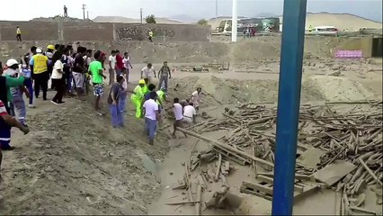 Peru floods: Woman scrambles out of devastating mudslide