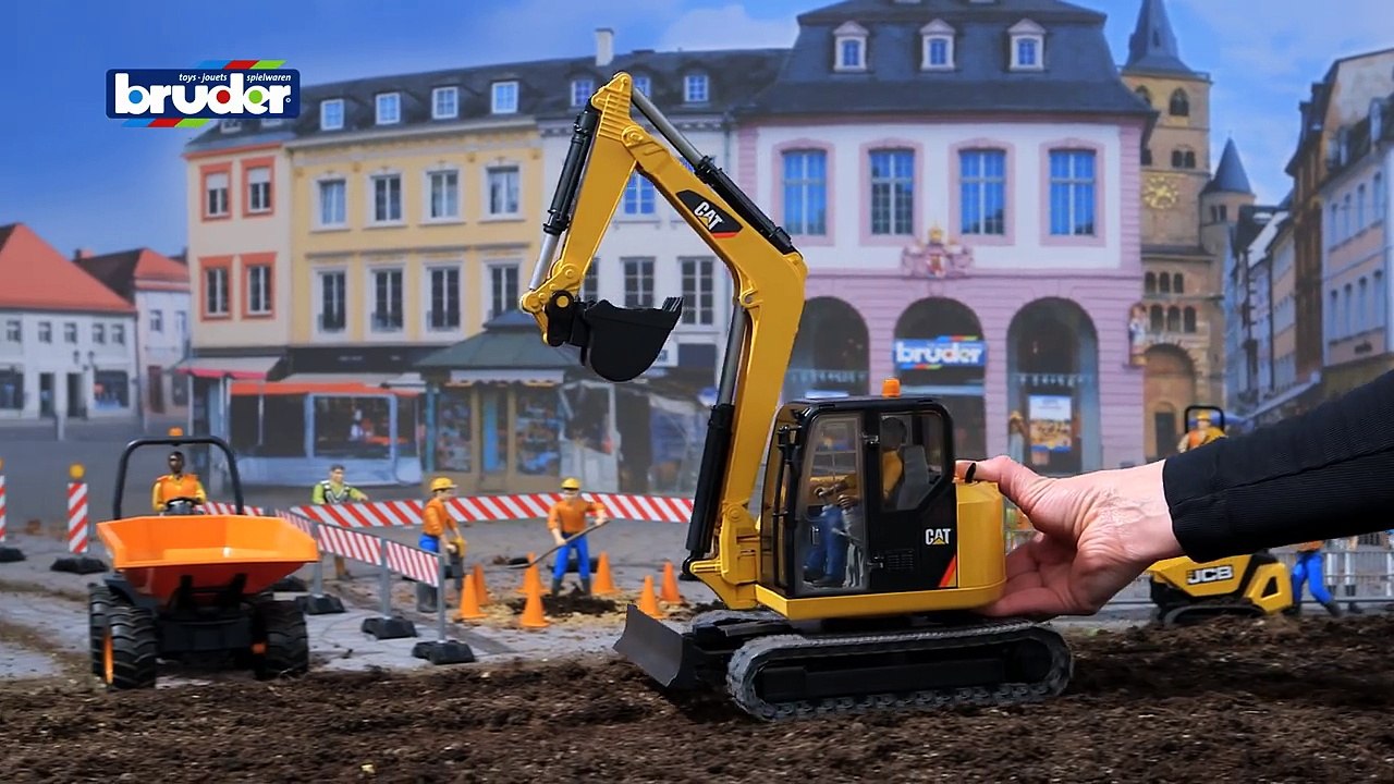 CAT Minibagger mit Bauarbeiter -- 02466 -- BRUDER Spielwaren-VYC2Wjc6Jeo