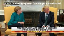 trump  refuses handshake from merkel.....