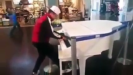 Kid surprises and amazes on public piano