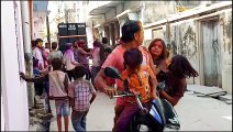 People Playing And Dancing with Colors on the Festival of Colors