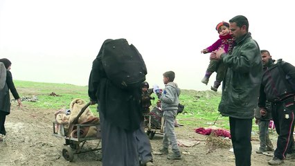 عراقيون يعودون الى غرب الموصل رغم استمرار المعارك