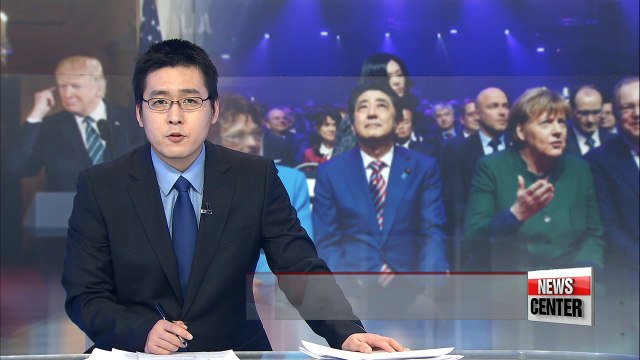 German Chancellor and Japan's PM defend free trade