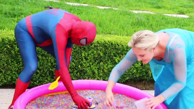 Frozen Elsa & Spiderman Buried Head in Orbeez sand surprise vs Joker Pranks Fun Superhero Real Life Nwprb