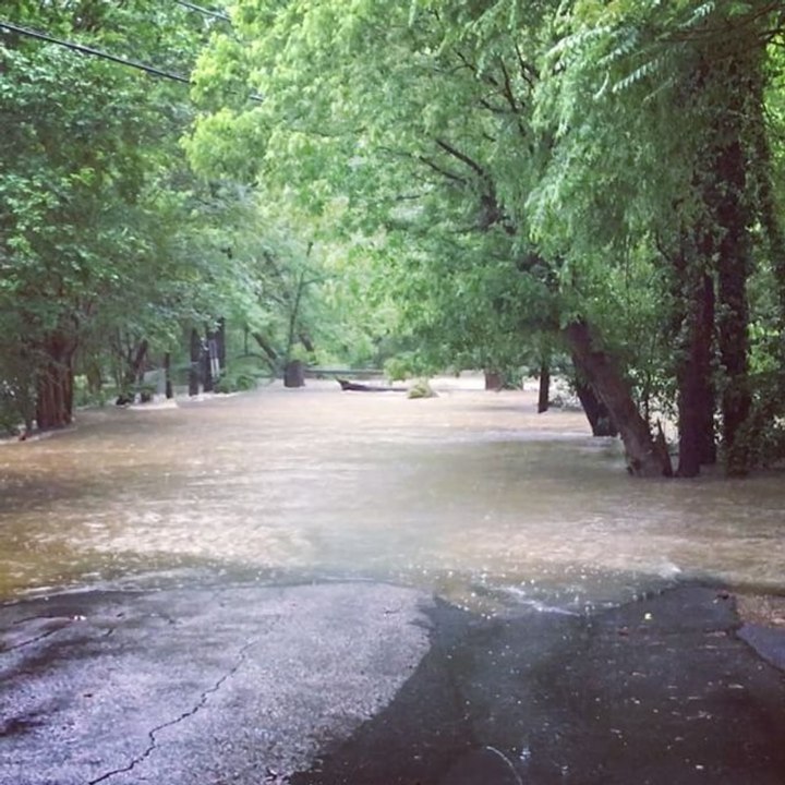 Creek Floods Entrance to Raleigh Neighborhood