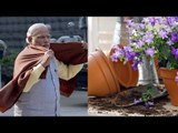 Woman throws flowerpot at PM Modi's convoy at South Block, held