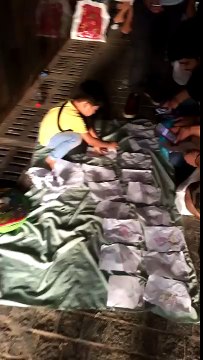 innocent kid selling simple drawings