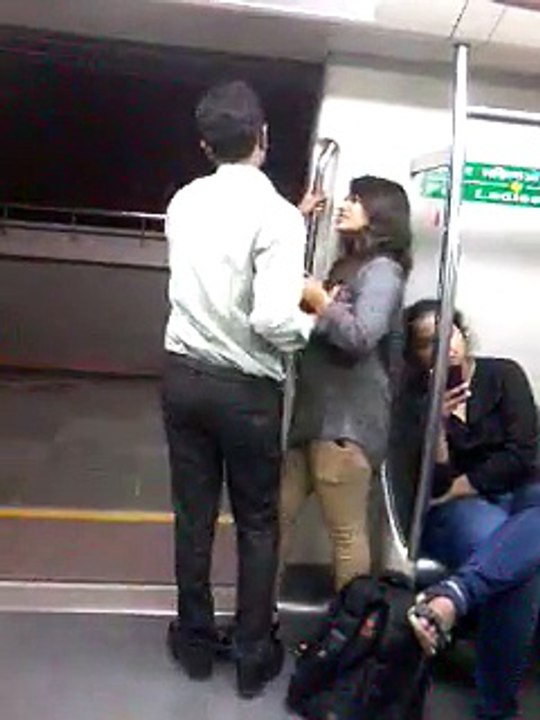 Couple making out in metro
