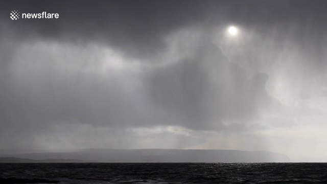 Hailstone curtains over Northern Ireland's Co Antrim Coast