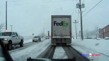 Police Dashcam Footage Captures Train Crashing Into FedEx Truck