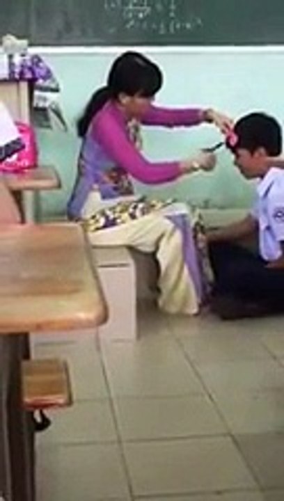 What is the Teacher doing