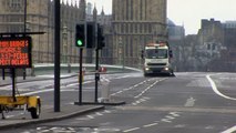 Clean up of Westminster Bridge begins as flowers laid
